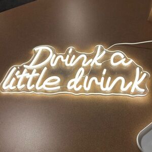 White Neon Sign 'Drink a Little Drink'